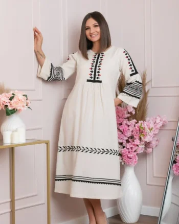 Rochie traditionala crem cu model floral negru Delia