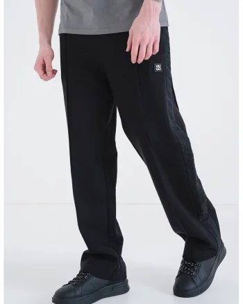 Pantaloni de trening cu segmente laterale brodate Drospant, Negru