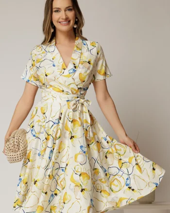 Rochie midi ivoar cu imprimeu galben cu aspect petrecut si cordon in talie