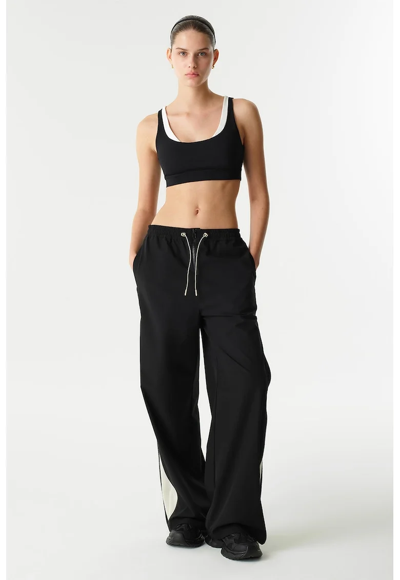 Pantaloni de trening cu croiala ampla si fermoare laterale, Negru