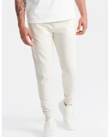 Pantaloni de trening din bumbac cu buzunare laterale, Crem