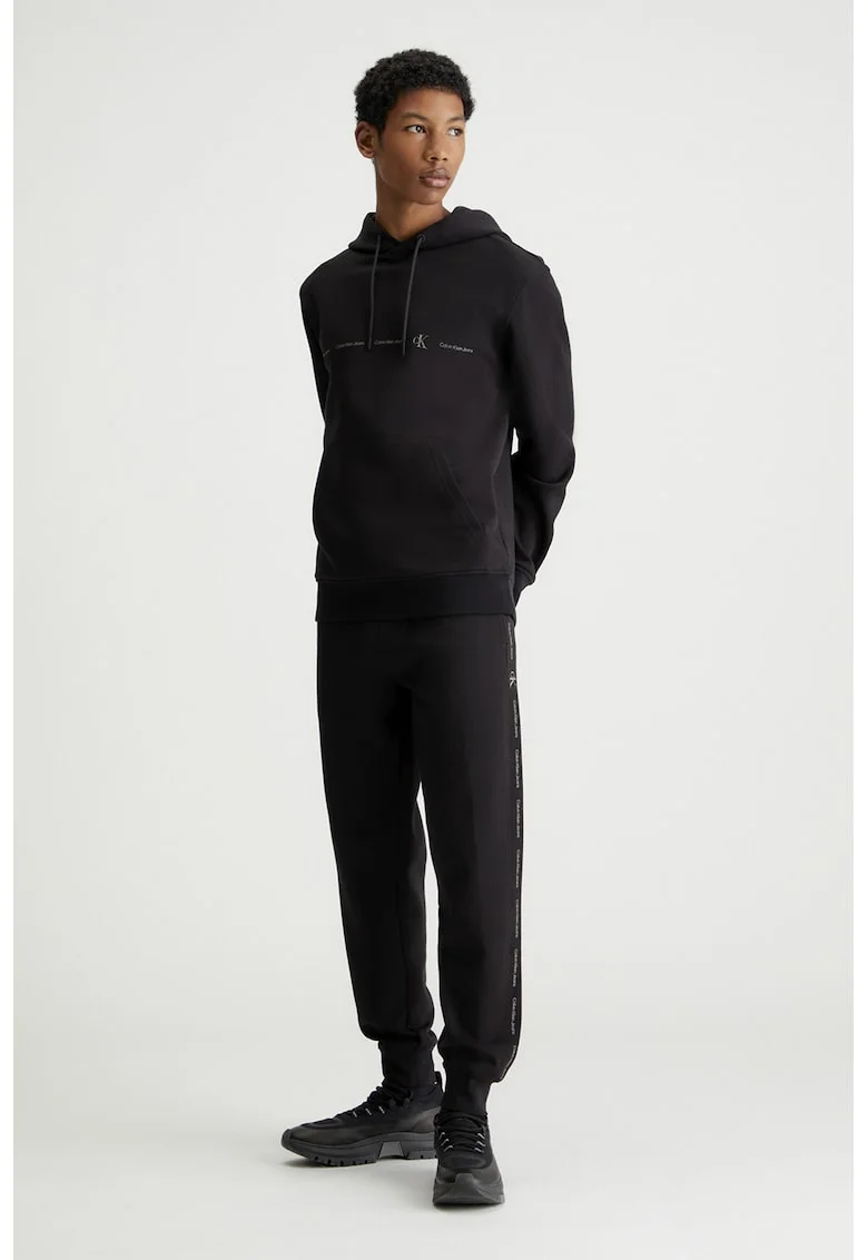 Pantaloni de trening cu croiala conica si benzi laterale cu logo, Negru