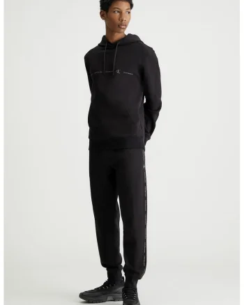 Pantaloni de trening cu croiala conica si benzi laterale cu logo, Negru