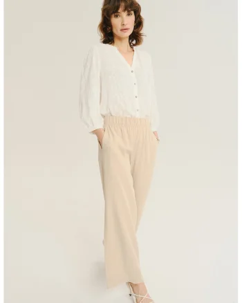 Pantaloni din lyocell cu croiala ampla si talie elastica, Crem