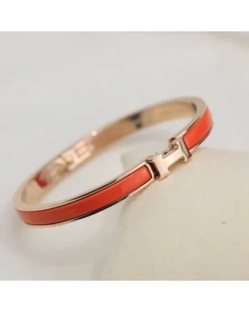 Bratara subtire  otel inoxidabil placat cu aur 14K, portocalie, diametru 6.5cm