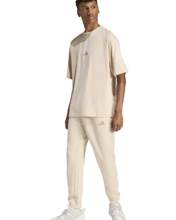 Pantaloni de trening conici cu buzunare laterale, Crem