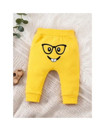 Pantaloni bebe galbeni bumbac imprimeu fata zambet confortabili