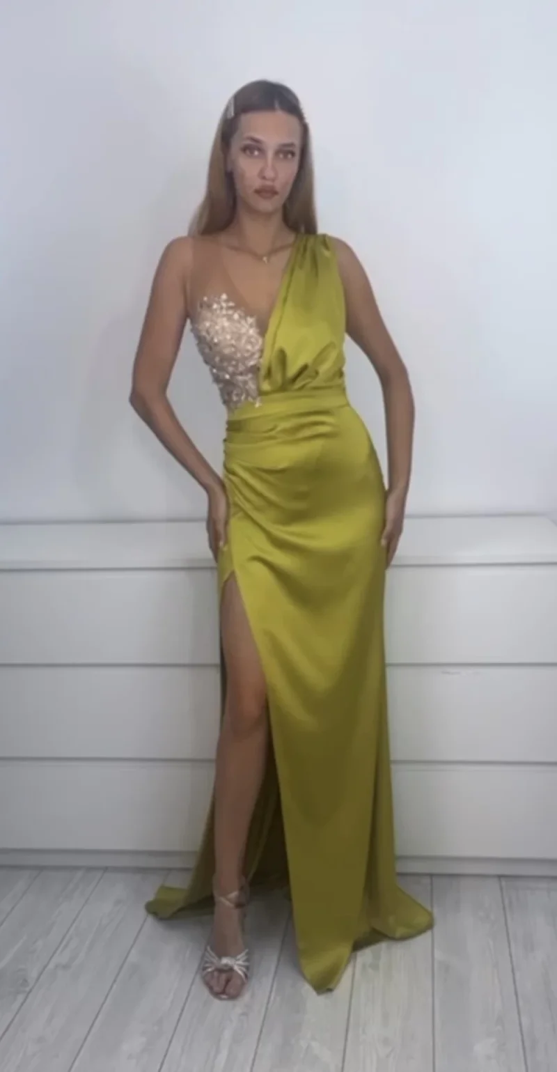 Rochie lunga eleganta din tafta fistic cu broderie pretioasa in partea superioara