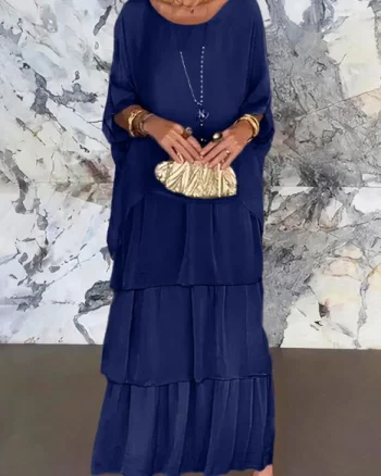 Rochie lunga suprapusa din matase si vascoza, cu trei volane mari si maneca cazuta, bleumarin