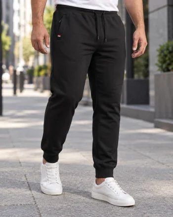 Pantaloni trening barbati marimi mari, negri, cu manseta, talie elastica si buzunare cu fermoar